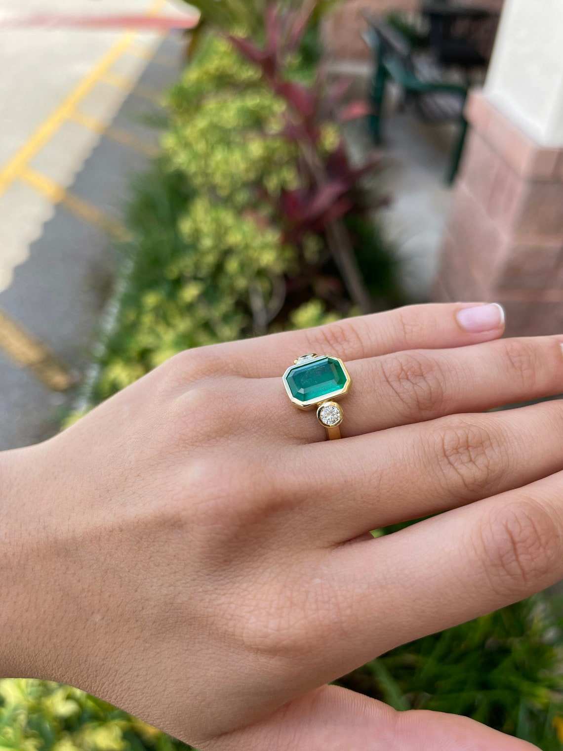 vintage-inspired dark green emerald and diamond ring 18K