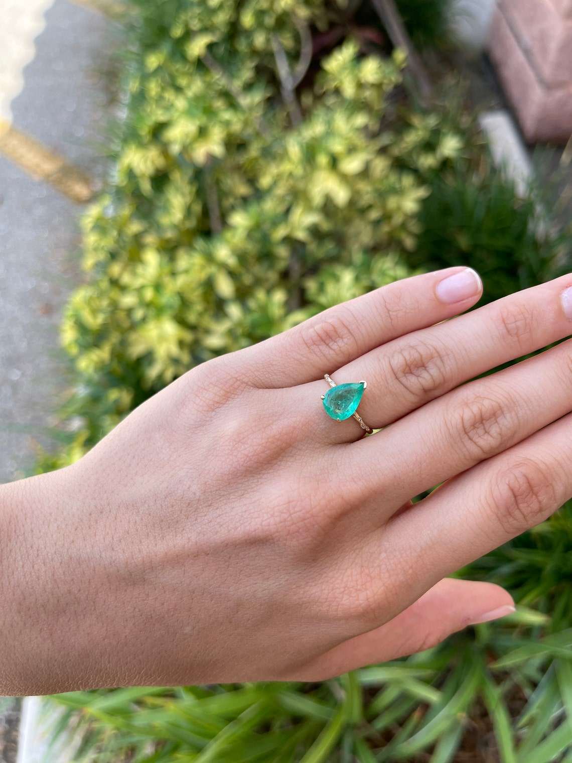 2.24tcw 14K Pear Emerald & Sprinkled Diamond Accent Ring