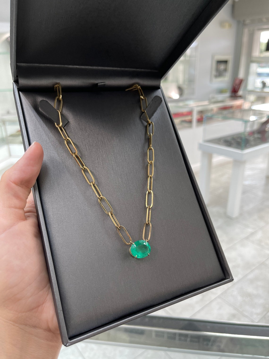 Large Colombian emerald 12.41 carat statement necklace in 14K gold