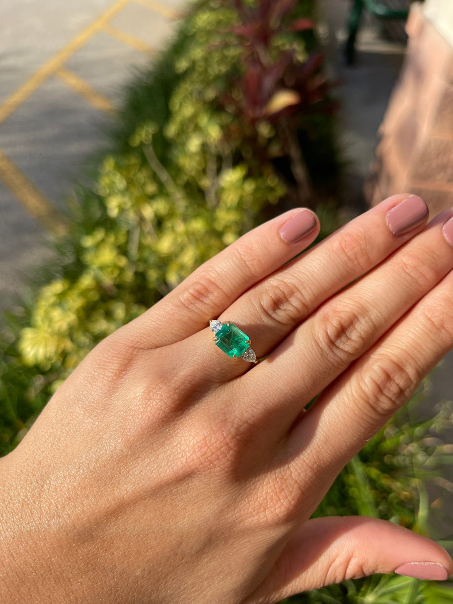 2.77tcw 18K Three Stone Emerald & Diamond Pear Cut Ring