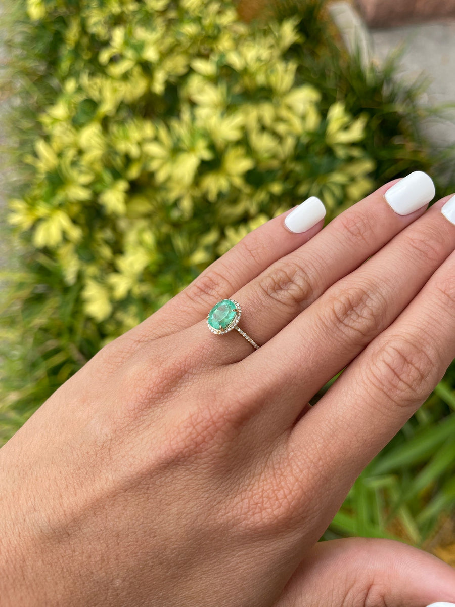 Opulent Radiance: 2.01tcw Pave Diamond Halo Engagement Ring in 14K Gold with Colombian Emerald Oval Cut