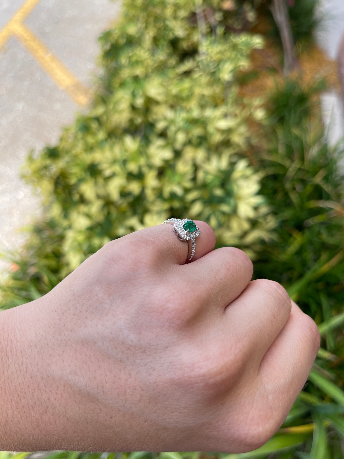 Celebrate Brilliance: 18K Gold Ring Featuring 1.05tcw Dark Green Emerald Oval Cut & Diamond Halo and Shank