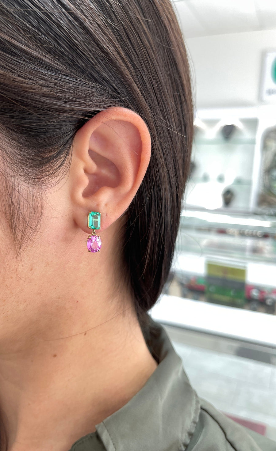 7.56tcw 18K Colombian Emerald & Pink Sapphire Dangle Earrings in Ear