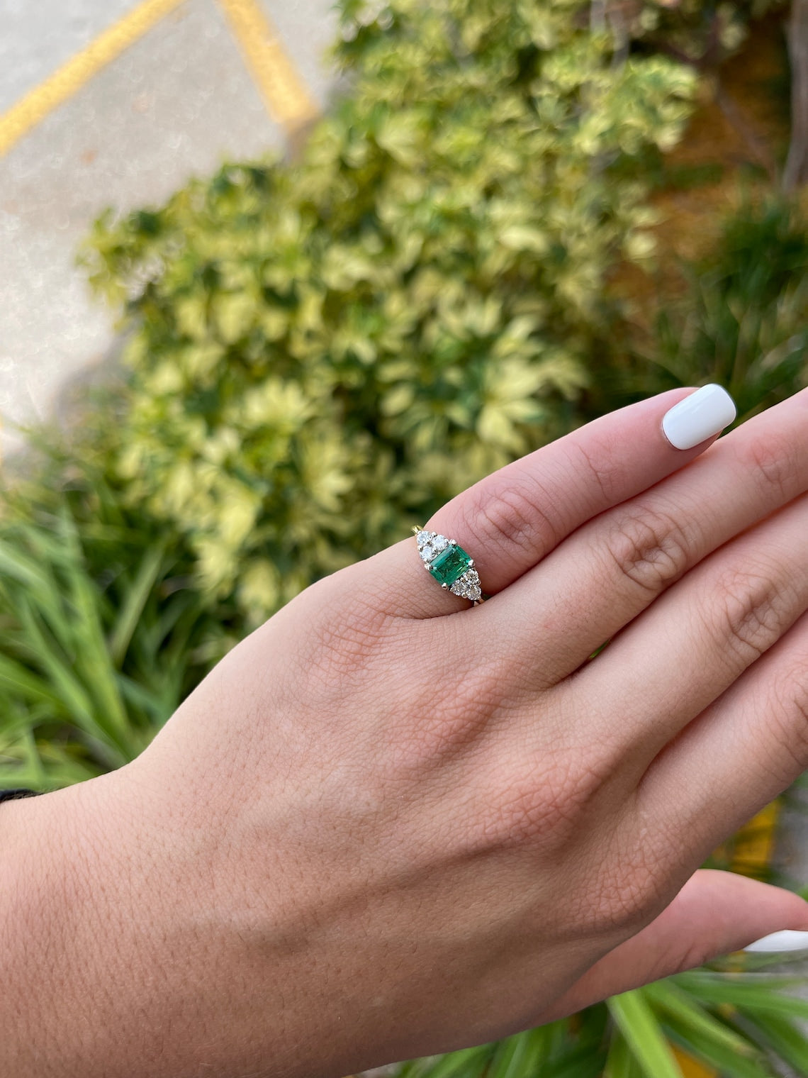 Emerald Cut & Diamond Accent Cluster Gold Ring on Hand