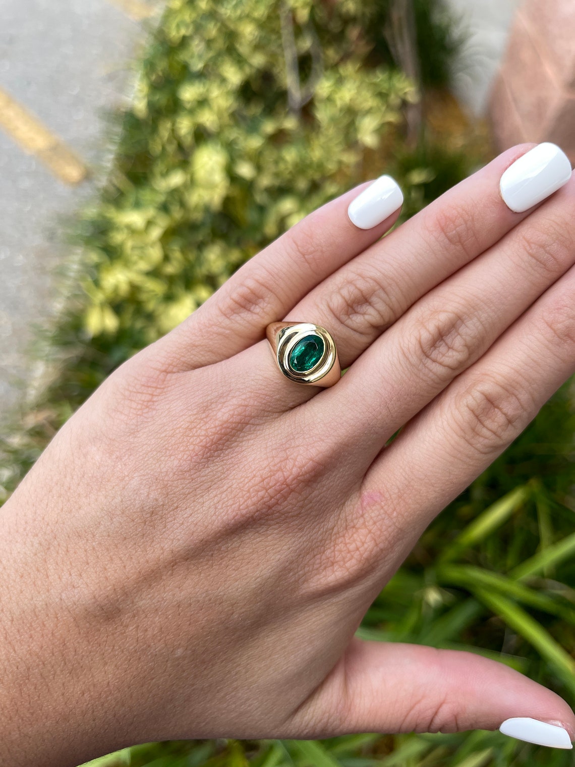 Rich Dark Green Oval Cut Ring on Hand