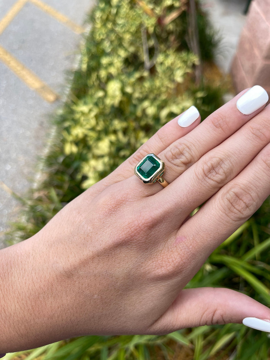 Emerald-Asscher Cut Solitaire Bezel Set Gold Statement Ring on Hand