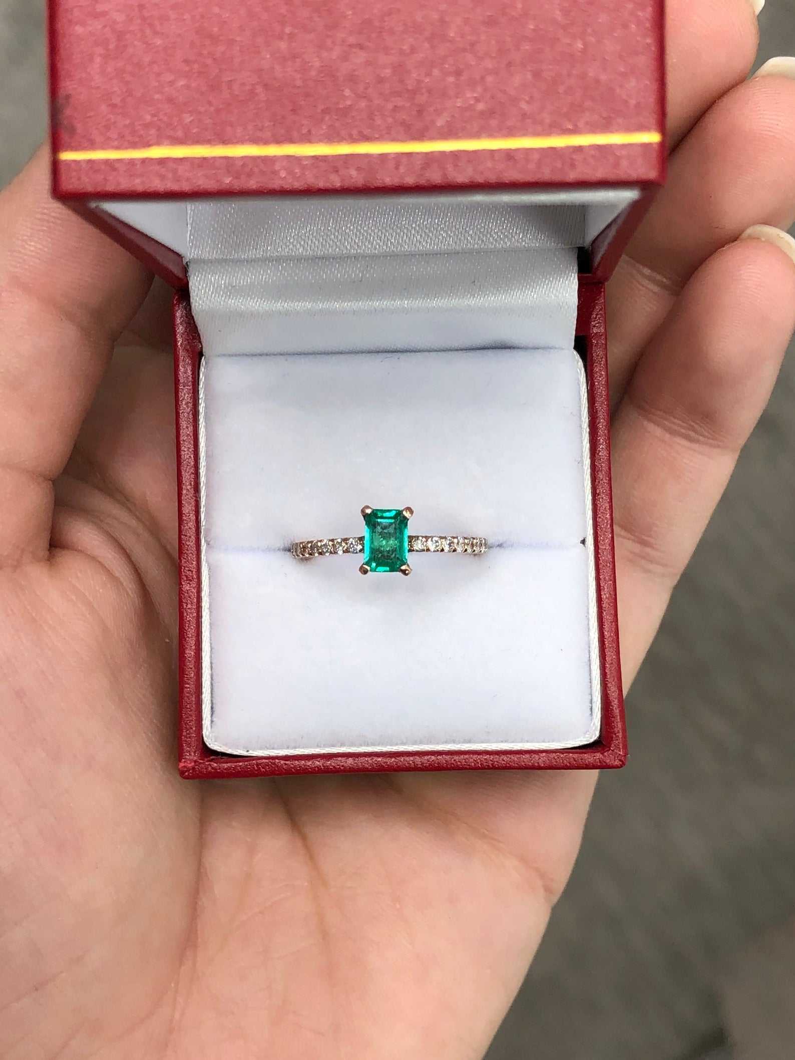 Celebrate Brilliance: 14K Gold Ring Featuring 1.10tcw Dainty Solitaire Emerald & Diamond Accent