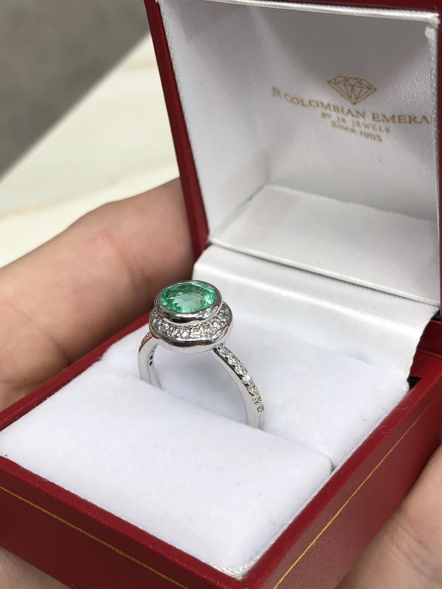 Celebrate Brilliance: 14K Gold Ring Featuring 1.60tcw Bezel Set Round Emerald & Diamond Halo