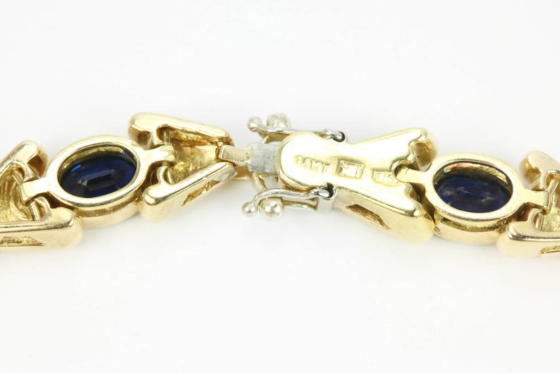 9.0tcw 14k Natural Sapphire Oval Yellow Gold Link Bow Tie Tennis BraceletJewelry