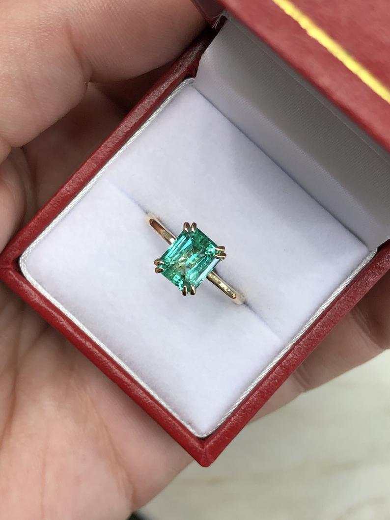 Dazzling Brilliance: 1.80cts Double Claw Prong Colombian Emerald Solitaire - A Shimmering Beauty