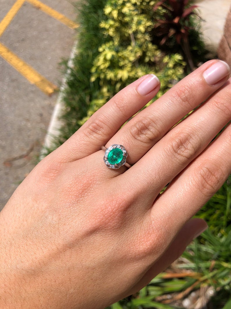 Emerald Oval & Floral Diamond Halo