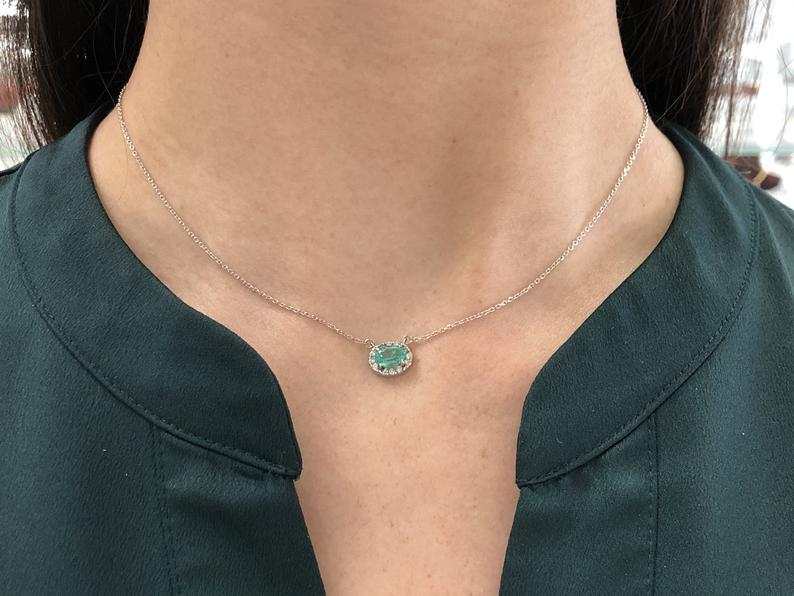 1.10tcw East to West Oval Emerald & Diamond Halo Necklace 14K