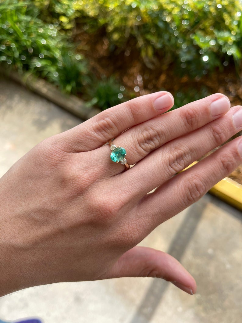  Oval Emerald & Diamond Ring