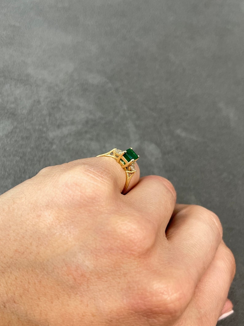 Celebrate Brilliance: 14K Gold Ring Featuring 1.22tcw Dark Green Emerald Cut & Pear Cut Diamond Trio