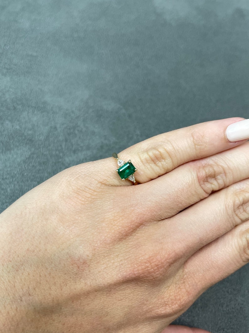 Classic Charm: Dark Green Emerald Cut & Pear Cut Diamond Three Stone 1.22tcw 14K Gold Engagement Ring