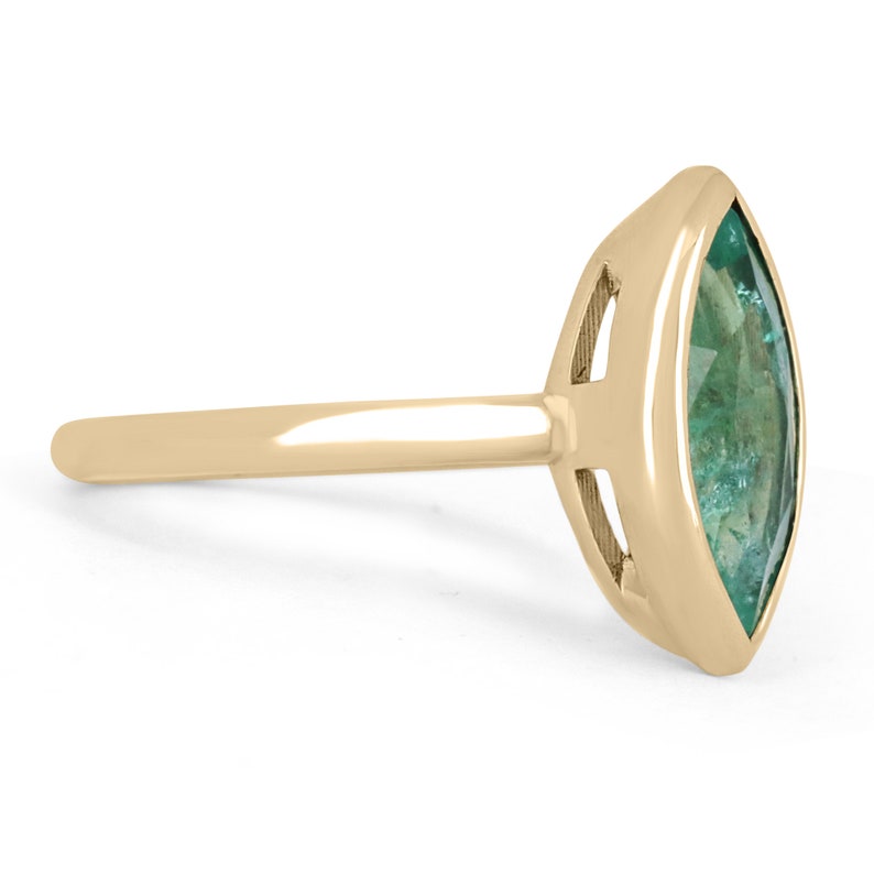 Emerald Marquise Cut Bezel Set Semi-Transparent Solitaire Ring