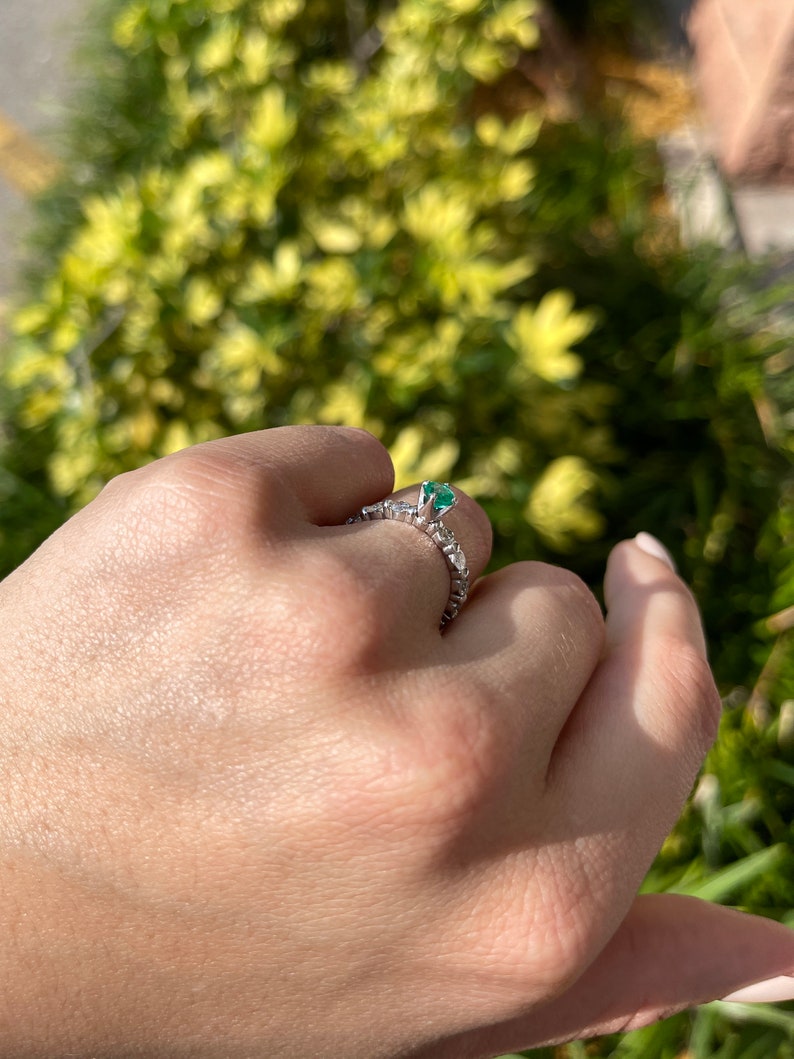 Celebrate Brilliance: 14K White Gold Ring Featuring 1.60tcw Natural Emerald & Diamond Accent