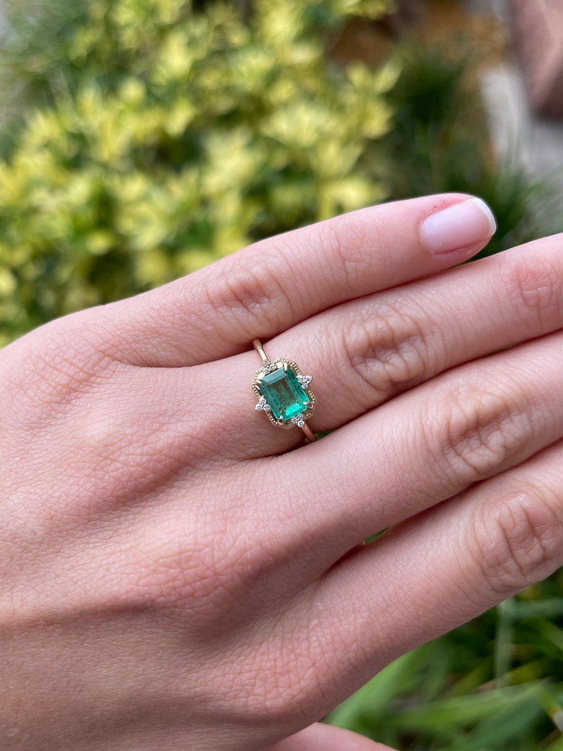 Natural Emerald Cut & Diamond Accents Engagement Ring on Hand