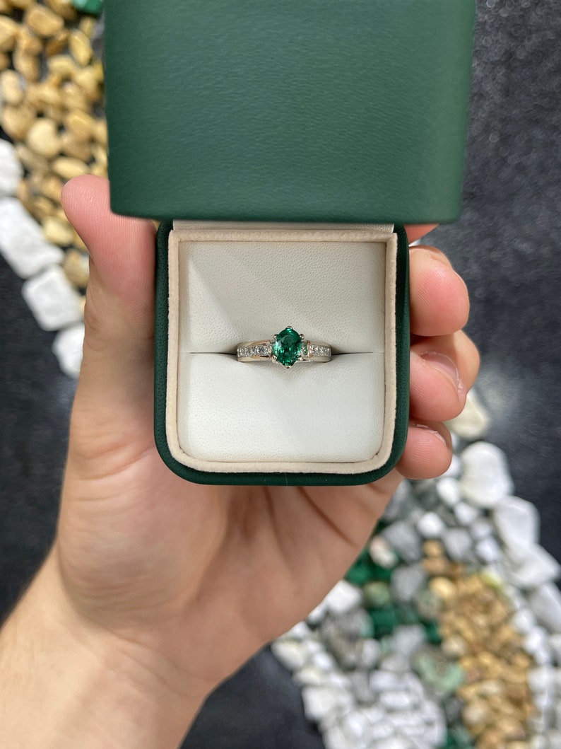 Exquisite Beauty: 1.0tcw 18K Natural Emerald Oval Cut Diamond Accent Engagement Ring