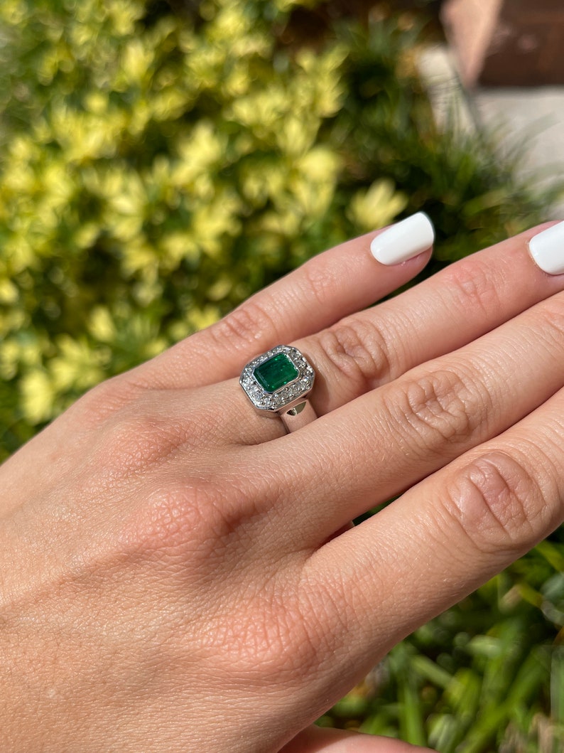 Natural Emerald Cut Diamond Halo Engagement Ring on Hand