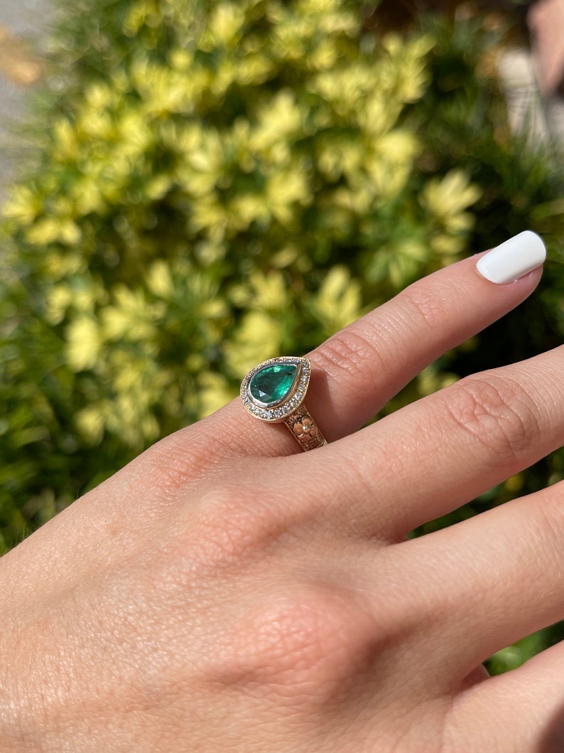 Natural Emerald Pear Cut Floral Design Diamond Ring on Hand