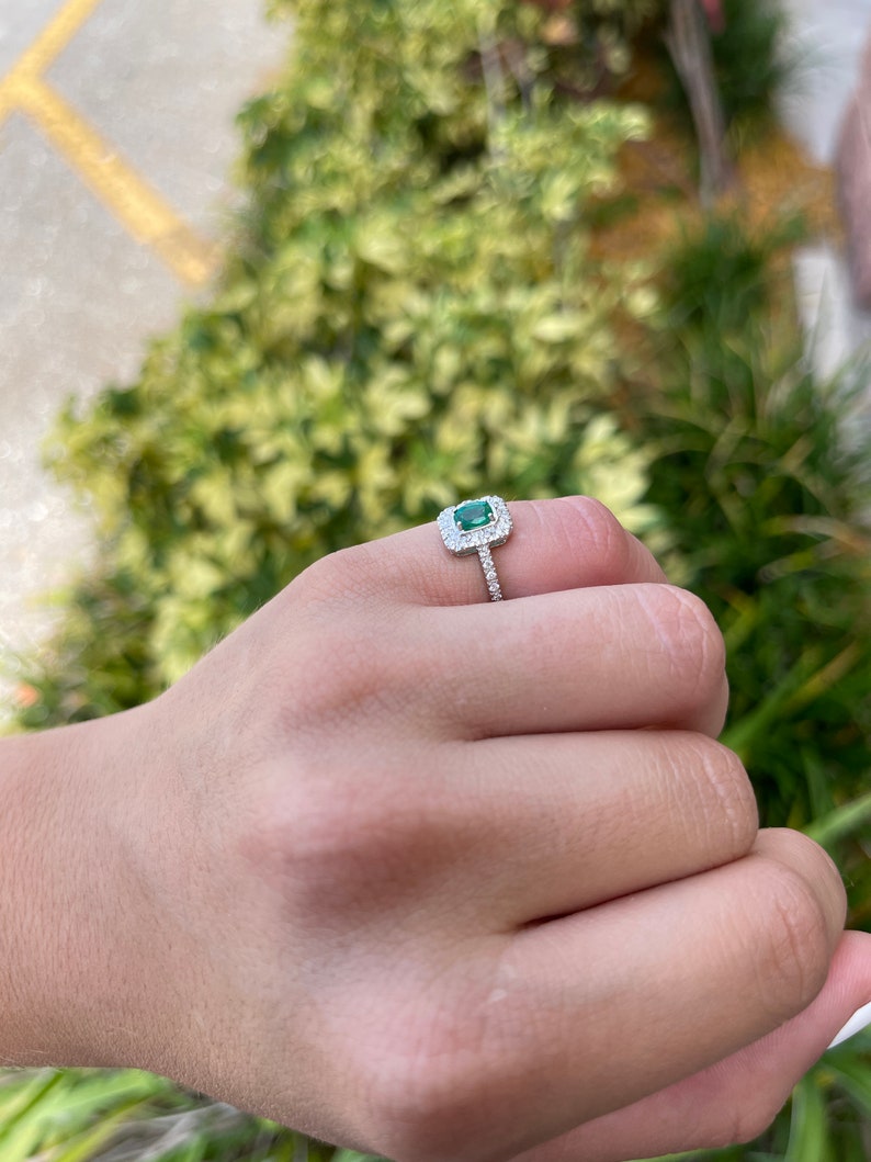 Elegance Unleashed: 1.05tcw Dark Green Emerald Oval Cut & Diamond Halo and Shank Engagement Ring