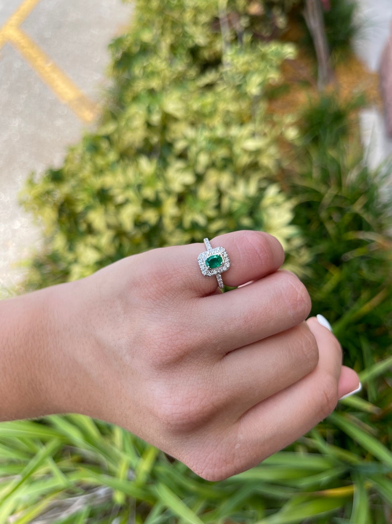 Classic Charm: Dark Green Emerald Oval Cut & Diamond Halo and Shank 1.05tcw 18K Gold Engagement Ring