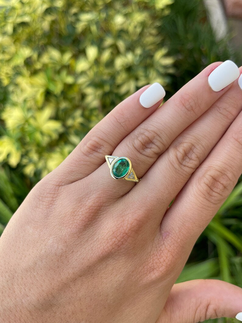 Oval Emerald & Trillion Cut Diamond Ring