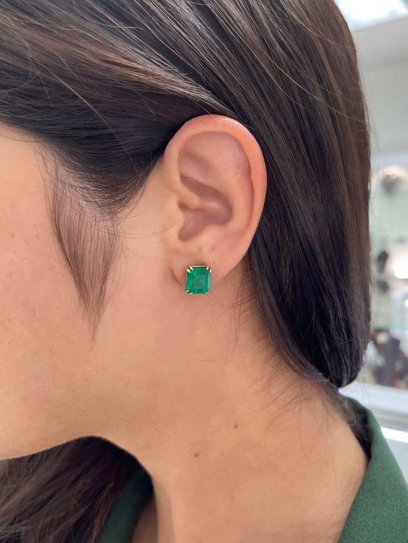 Emerald Cut Double Claw Prong Stud Earrings on Ear