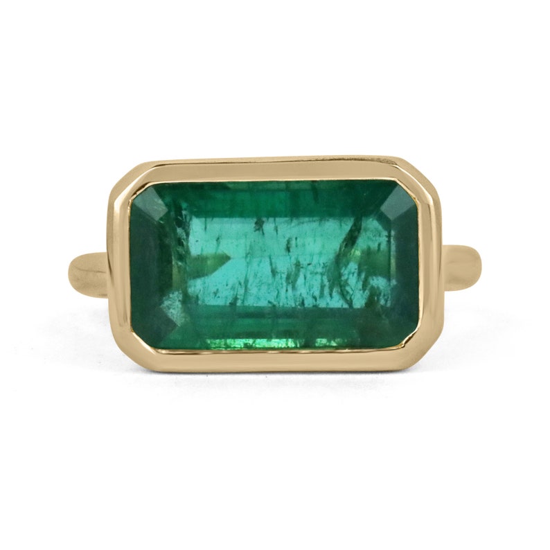 Emerald East to West Solitaire Ring