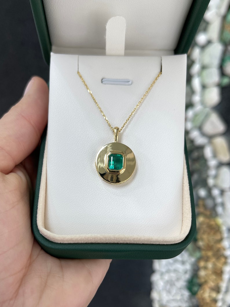 Emerald Bezel Set in Solid Gold