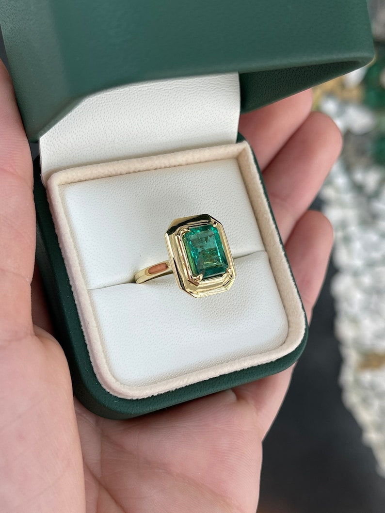 2.77ct 18K Natural Emerald Cut Medium Mossy Green Four Prong Half Bezel Set Solitaire Yellow Gold Engagement Ring - JR Colombian Emeralds