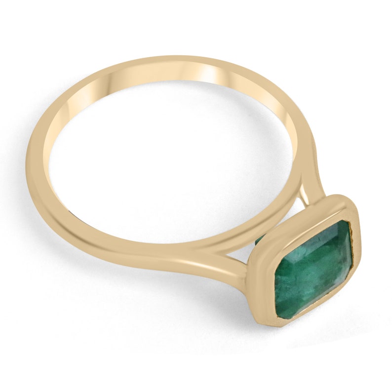 E-W Solitaire Emerald Ring