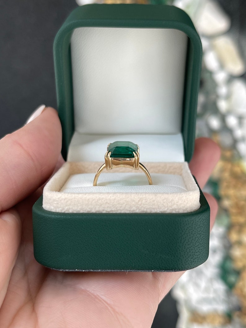 Emerald Solitaire Engagement Ring