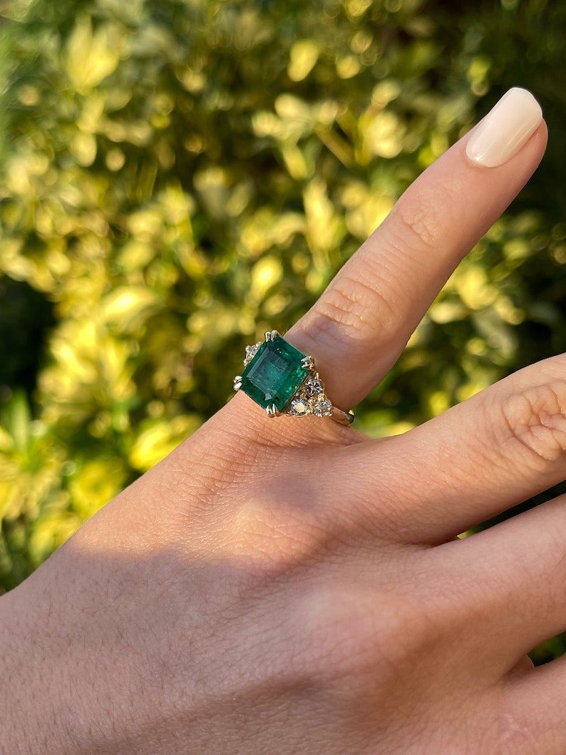 5.22tcw 14K Gold Freckled Emerald Cut & Diamond Accent Cluster Three Stone Engagement Ring - JR Colombian Emeralds