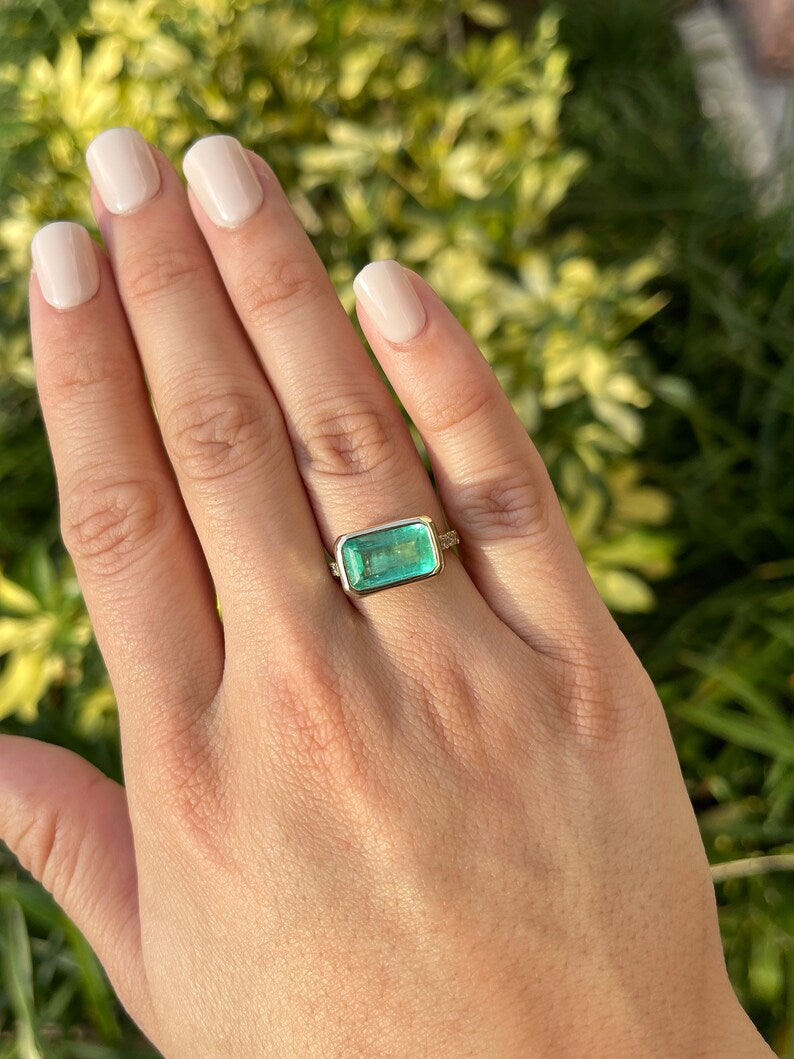 East-West Emerald Cut & Diamond Accent Ring
