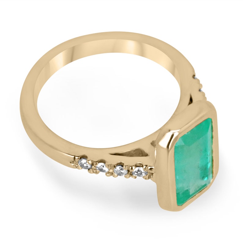Emerald Cut & Diamond Accent Ring