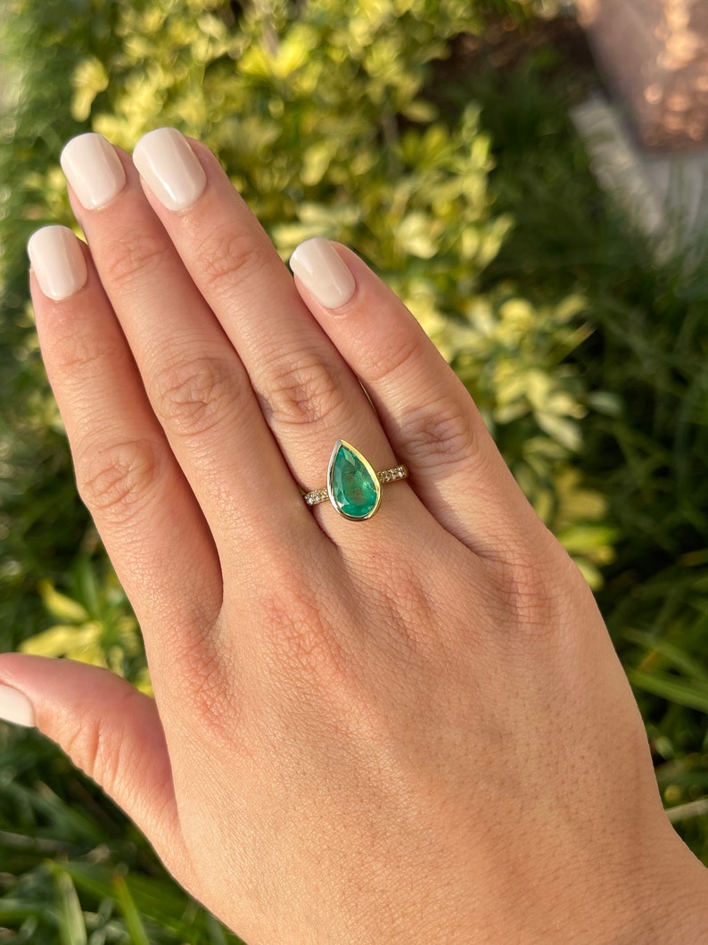 3.36tcw 18K Gold Bezel Emerald Pear Cut Ring