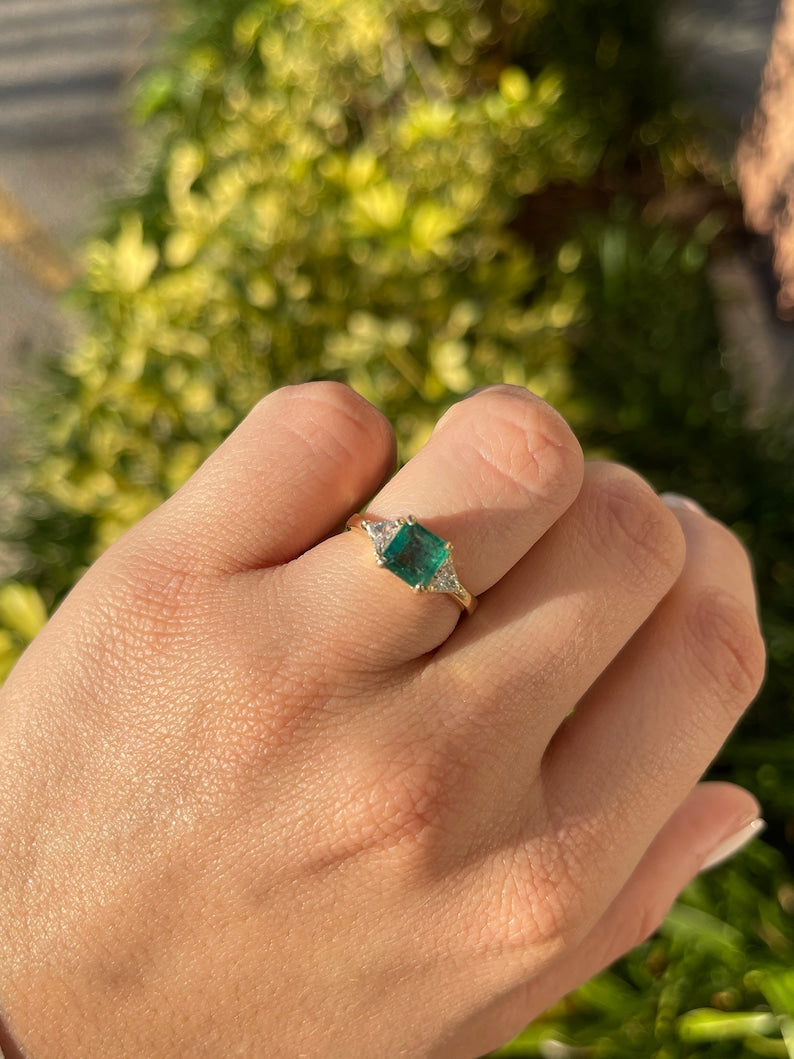 Emerald ring with deals trillion side diamonds