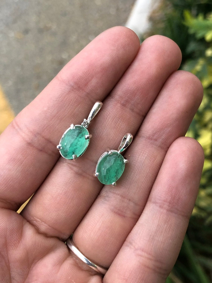 Cabochon emerald and diamond pendant in silver 