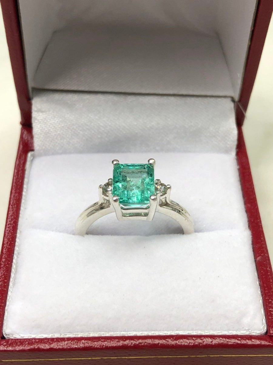 2.08tcw Emerald Cut Three Stone Emerald & Diamond Ring