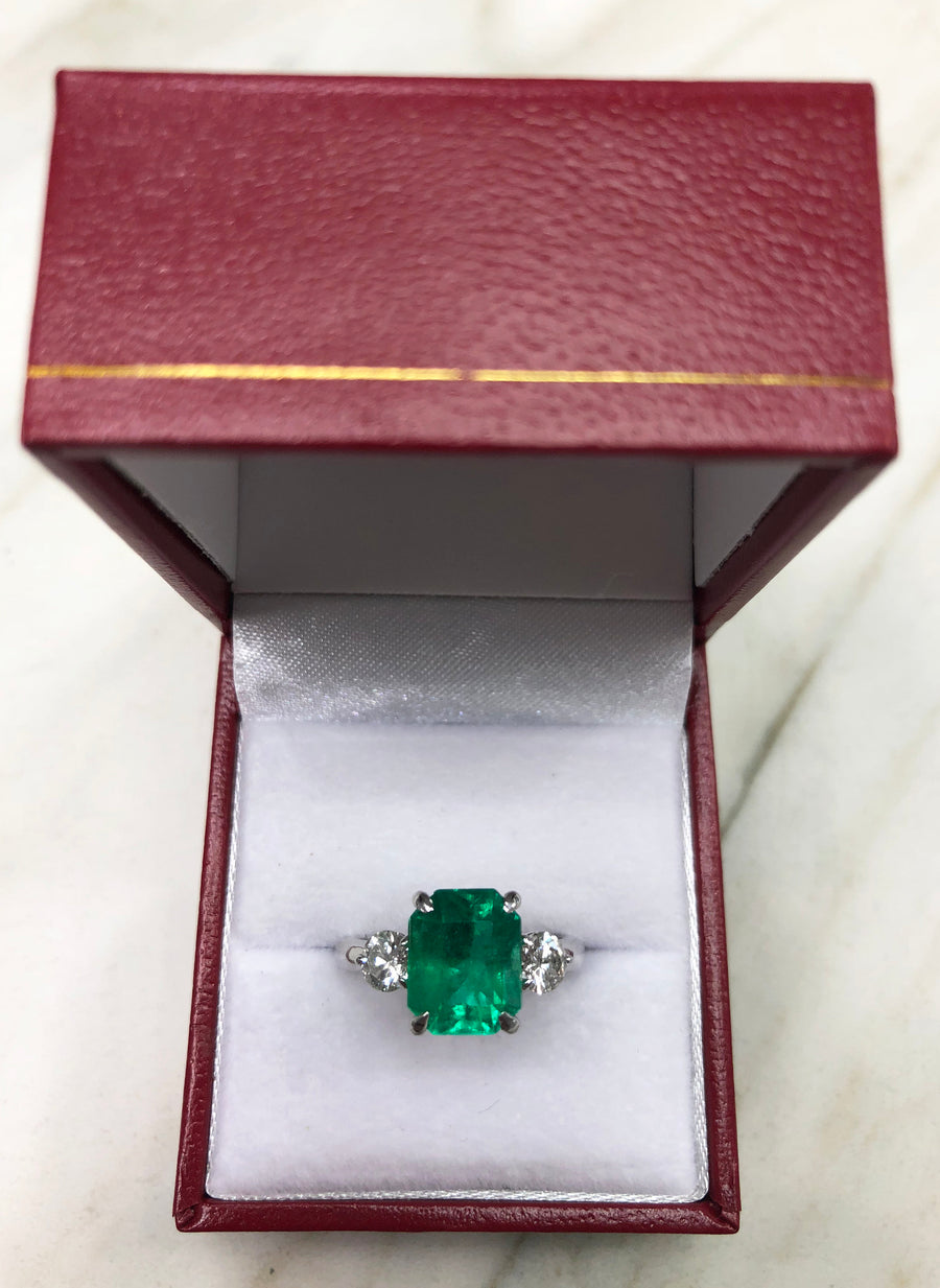 Three Stone Emerald & Round Diamond Accent Ring
