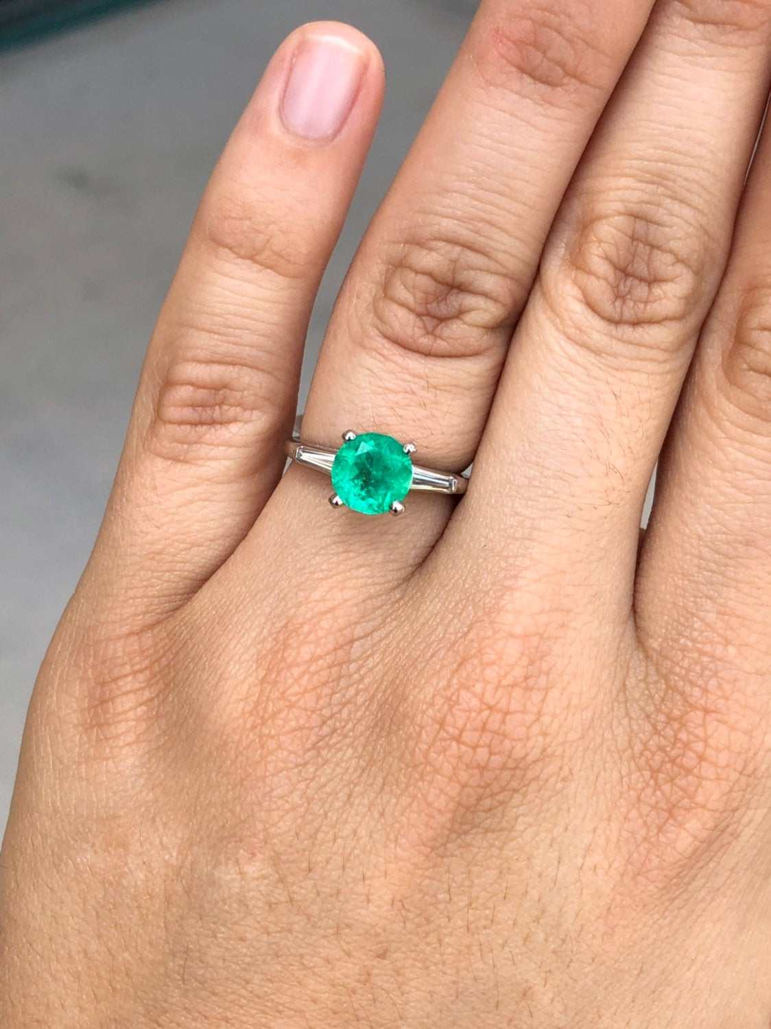 Round Emerald & Tapered Diamond Platinum Engagement