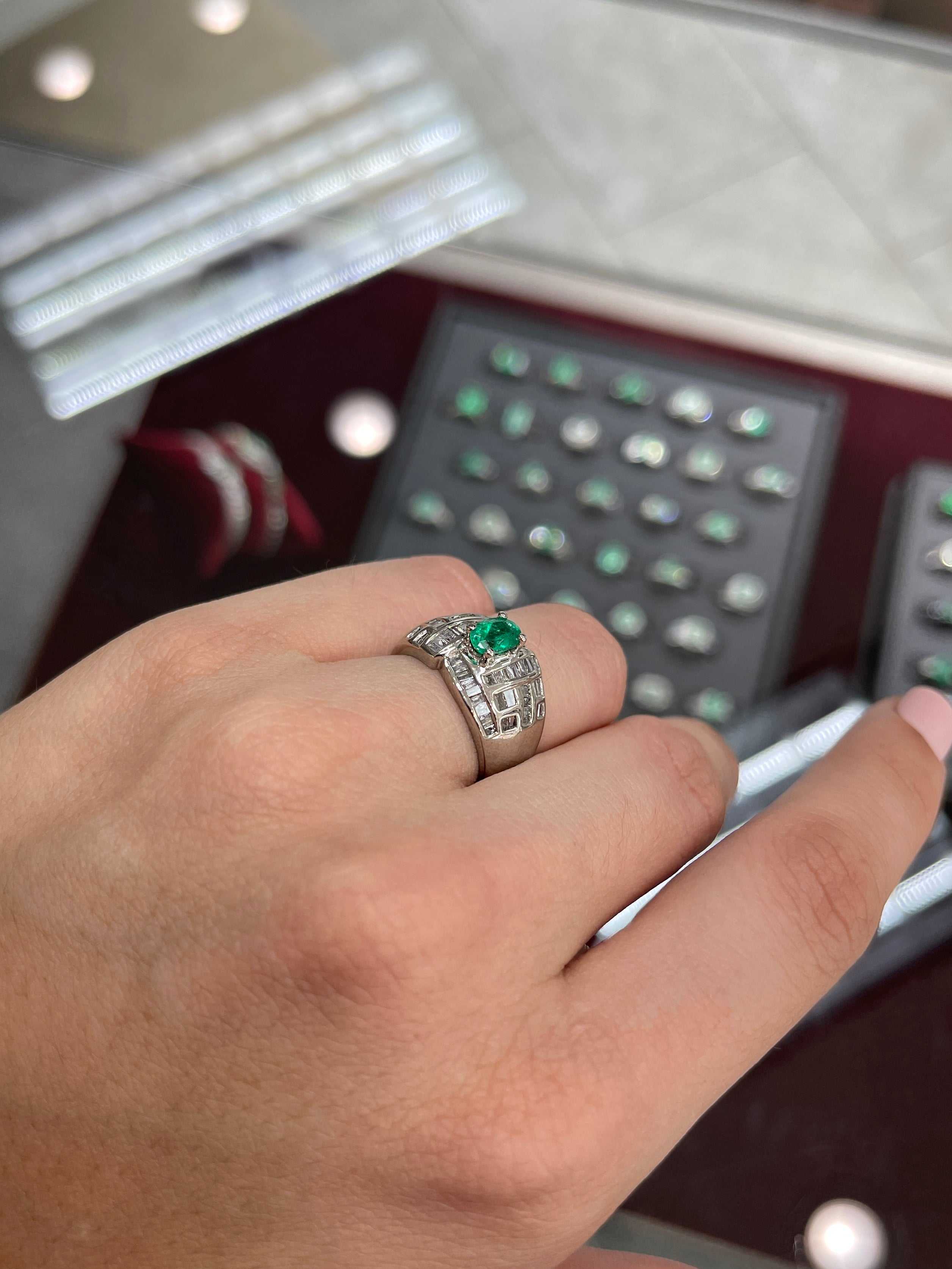 18K Colombian Emerald and Diamond Baguette Cocktail Ring with oval-cut emerald and sparkling diamonds by JR Colombian Emeralds