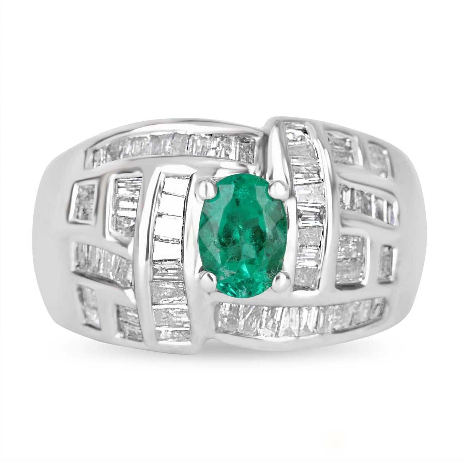 18K gold Colombian emerald and diamond baguette cocktail ring with oval cut emerald, featuring sparkling accents, by JR Colombian Emeralds