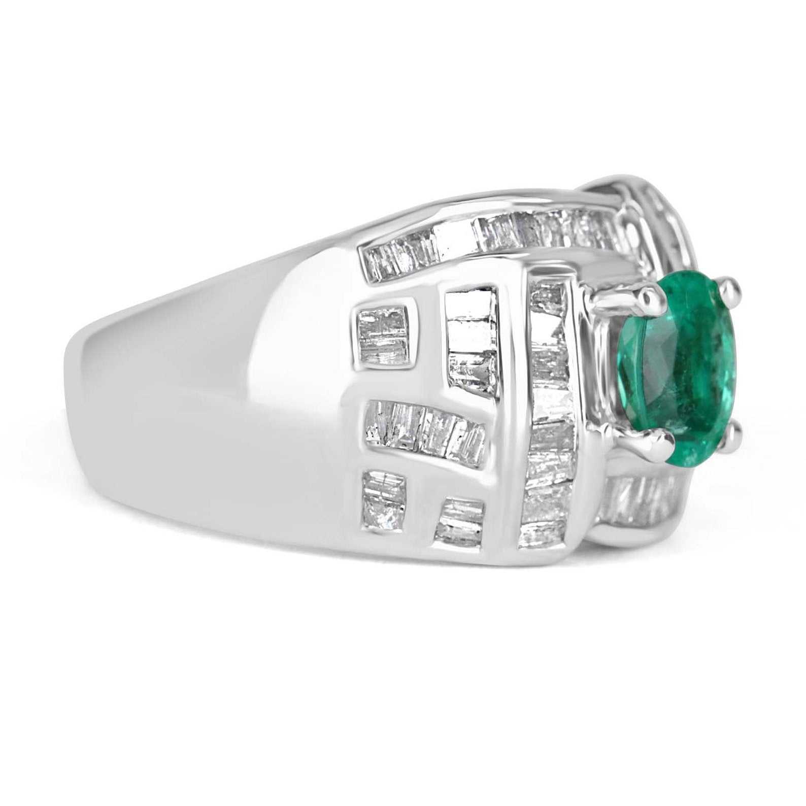 18K Colombian emerald and diamond baguette cocktail ring with oval-cut emerald, featuring sparkling diamonds, by JR Colombian Emeralds.