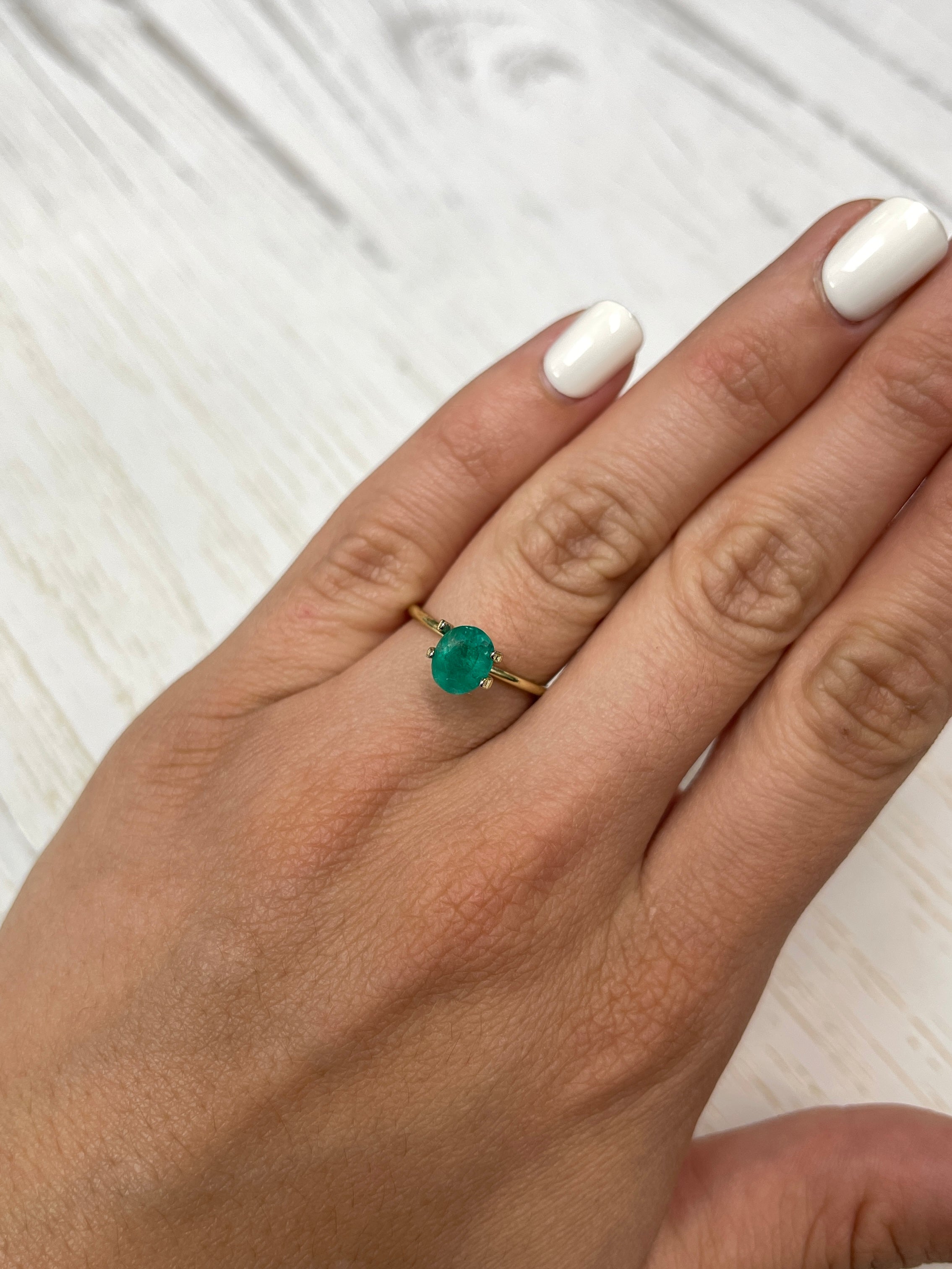 Oval cut 1.19 carat semi-transparent rich green Colombian emerald, natural loose gemstone by JR Colombian Emeralds