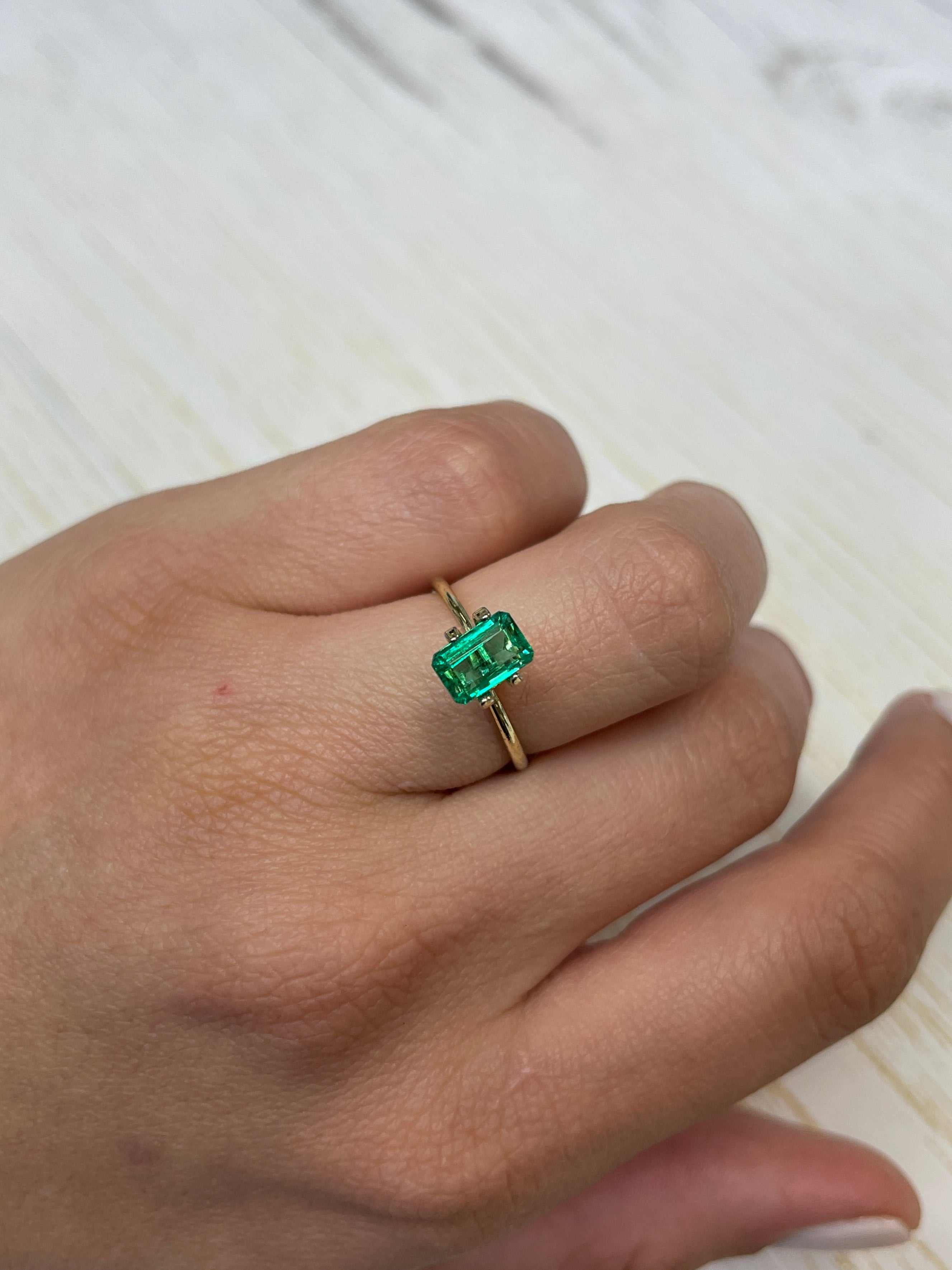 Elongated 8x5 mm Muzo green Colombian emerald loose gemstone, natural, emerald cut, 1.50 carats, from JR Colombian Emeralds.