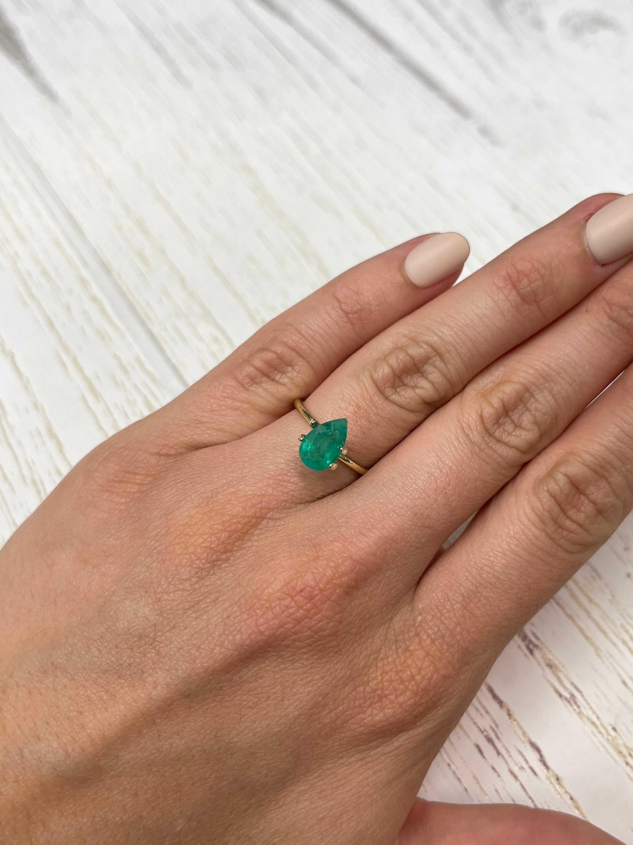 1.62 carat rich green natural Colombian emerald loose pear cut gemstone from JR Colombian Emeralds.