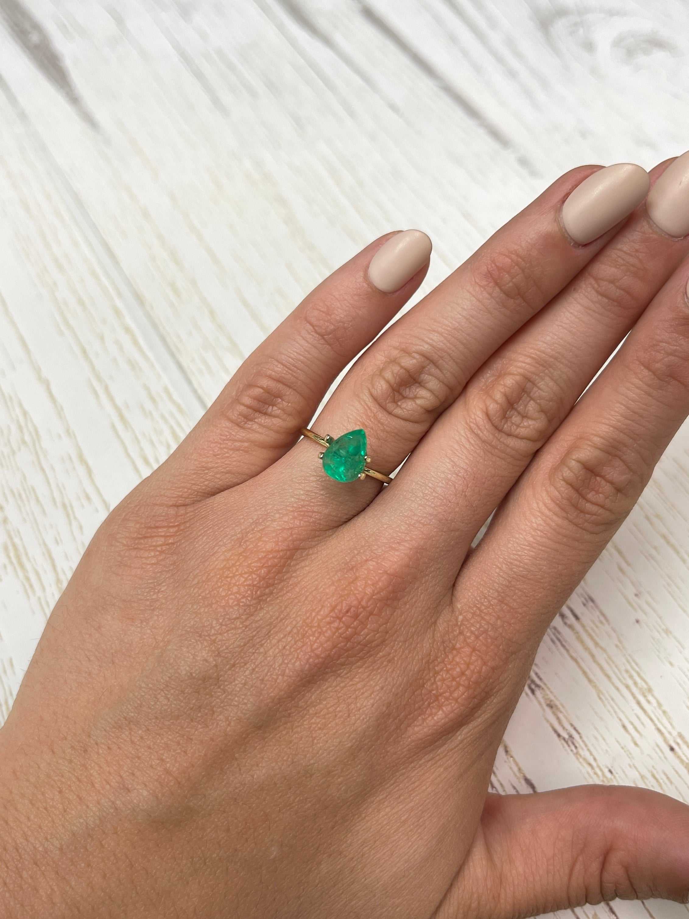 Natural loose Colombian emerald with 1.81 carats, pear cut, vibrant spring green, from JR Colombian Emeralds.